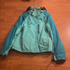 Women's Teal Jacket Under Armour used some staining